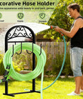 Garden Hose Holder Stand Rustproof Freestanding Heavy Duty With Beefy Metal Frame And Hanger in outdoor garden setting