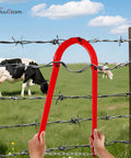 Hands using Beefy Heavy Duty Fence Stretcher Fixer And Wire Tightener Tool 7.7 Lbs on barbed wire with cows in background