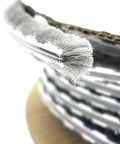 Close-up of 100 Ft Roll Zipper Pile Weatherstrip with 0.250 Inch Pile Height and 0.187 Inch Backing Gray, heavy duty seal.