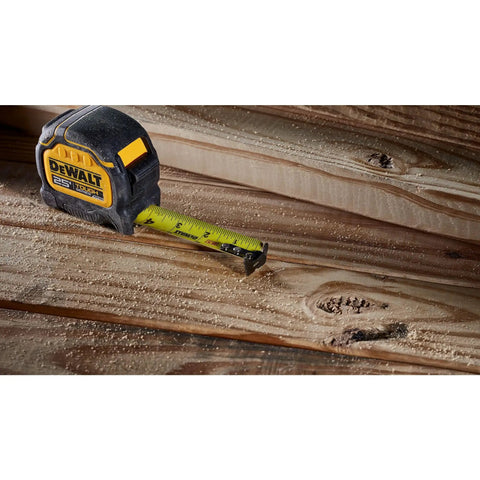 Tough Series 25 Ft Tape Measure With Magnetic Clip And Double Sided Blade Pro Grade Heavy Duty Housing on wooden surface