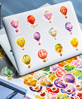 Laptop decorated with 50 Piece Hot Air Balloon Sticker Pack For Teens And Creative Vibes Waterproof Vinyl Balloons Stickers Set
