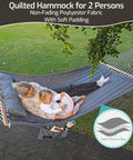 Double Quilted Fabric Hammock With Hardwood Spreader Bars And Pillow 450 Lbs Capacity Two Person Outdoor Patio Hammock scene.