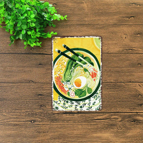 Vintage Ramen Tin Sign Metal Wall Art 8x12 Inch Aluminum Poster For Home Office Garage Decor With Pre Drilled Holes Easy To Mount Rustic Retro Kitchen Bar Sign on wooden surface with chopsticks and leafy greens design.