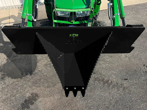 Compact Stump Bucket for Small Tractors That Delivers Max Leverage To Tackle Huge Stumps, front view mounted on green tractor