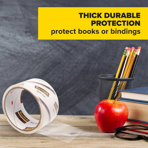 Clear Book Tape 1.5 Inch By 540 Inch One Roll for repairs and reinforcement of book covers and pages, shown with pencils and apple