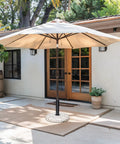 Outdoor patio with umbrella on a 45Lbs Concrete Umbrella Base With Cobblestone Decor Heavy Duty Outdoor Umbrella Stand For Deck Poolside Yard Stable Concrete Counterweight Keeps Your Umbrella Upright.