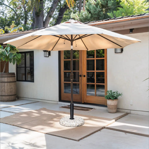 Outdoor patio with umbrella on a 45Lbs Concrete Umbrella Base With Cobblestone Decor Heavy Duty Outdoor Umbrella Stand For Deck Poolside Yard Stable Concrete Counterweight Keeps Your Umbrella Upright.