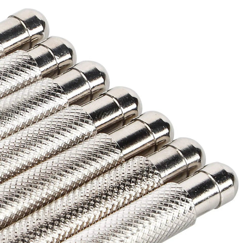 Close-up of metallic tools from 7 Piece Watch Crown Winder Tool Set 3.0 To 7.0mm for easy mechanical winding and watchmaking.