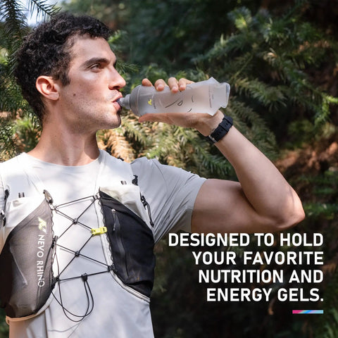 Man wearing 5L Hydration Running Vest With Dual 500ml Soft Flasks, Lightweight Nylon Pack, Adjustable Chest Straps, drinking water, outdoors