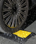 Car wheel on Two Pack 3 Channel Cable Ramp Protector For Wires And Hoses, Heavy Duty PVC Rubber Cord Protector Ramps in rain