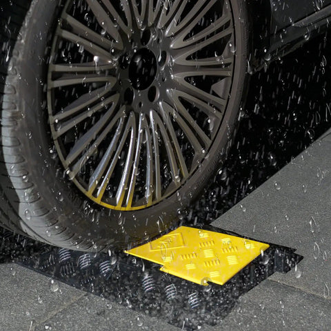 Car wheel on Two Pack 3 Channel Cable Ramp Protector For Wires And Hoses, Heavy Duty PVC Rubber Cord Protector Ramps in rain