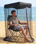 Man relaxing in a 63 Inch Mosquito Net Cover For Canopy Chair With Waterproof Roof And Opening Zipper Heavy Duty Bug Barrier Mesh