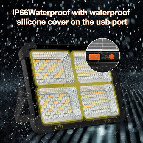 Portable Solar LED Work Light 100W With 336 LEDs, 15000 Lumens, IP66 waterproof silicone cover, USB port detail, rain background