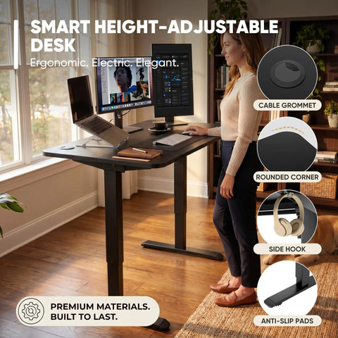Woman using 55 By 24 Inch Electric Height Adjustable Standing Desk For Home Office With Memory Preset And T Shaped Metal Bracket