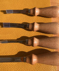 Wide Mouth Leather Edge Skiving Beveler Set Pro Grade With Six Blades Skiver Knife For Leather Craft DIY shown on leather surface.