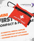 Front view of Lightning X mini first aid kit; red water-resistant nylon pouch with zipper and carabiner.