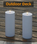 Outdoor Flameless LED Pillar Candles Set Of 2 11 By 4 Inches Waterproof on an outdoor deck
