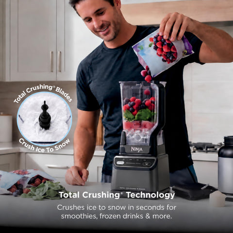 Top Shelf Professional Blender With 1200 Watt Motor And Auto Iq Technology 72 Oz Pitcher For Smoothies And Shakes filled with fruits.