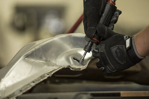 Premium Composite Body Die Grinder With Rock Solid Safety Lever And Built In Regulator For Pneumatic Applications Quarter Inch setup grinding metal surface.