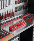 Eight Piece Socket Organizer Set With Six Socket Trays And Two Wrench Racks For One Quarter Inch Three Eighths Inch And One Half Inch Sockets And Metric SAE Tools For Your Garage Or Toolbox on a workbench.
