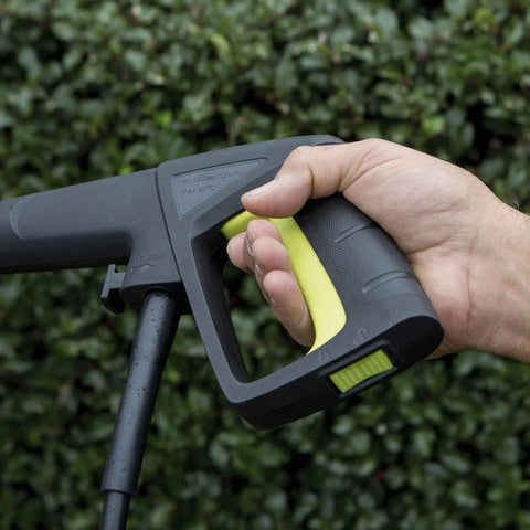 Close-up of a hand gripping the handle of a Powerful 12 Amp Electric Pressure Washer With Adjustable Spray Wand For Home Cleaning.