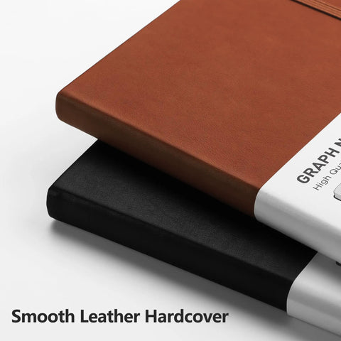 Close-up of Everyday Carry Graph Grid Paper Notebook In A5 Size With Leather Hardcover in brown and black stacked, showing texture.
