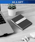 Slim Metal Business Card Holder with RFID Blocking PU Leather Case for Women or Men, Boss Vibe Black Carbon on desk