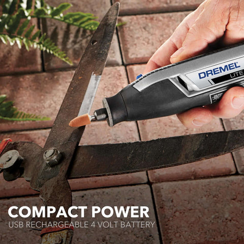 Dremel Lite cordless rotary tool with small sanding bit attached, gray and black body, side view