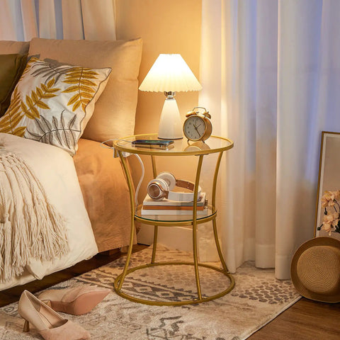 Round End Table With Charging Station And Glass Top, 2-Tier Gold Accent Side Table For Tiny Spaces next to bed with lamp and decor