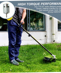 Man using Heavy Duty 775 DC Electric Motor 21V High Torque Wear Resistant Shaft for lawn mowing.