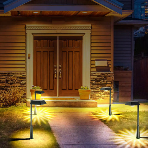 Solar Pathway Lights 4 Pack With 200 Lumen Brightness IP65 Waterproof Outdoor Garden Lights illuminating walkway at night