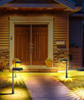 Solar Pathway Lights Outdoor Easy Install 200 Lumen Warm White Garden Driveway Yard Lighting illuminating a front walkway
