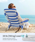 Woman seated on Backpack Beach Chair With Four Adjustable Backrest Angles, 331 Lb Capacity, Two Side Pockets And Towel Bar