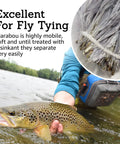 Go To Marabou Feathers For Fly Tying Bundle; angler holding fish; soft natural marabou for tail and wing.