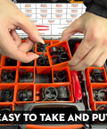 Hands holding spring clamps from 324 Piece Spring Hose Clamp Kit with 6-38mm range and 2 pliers for quick leaks fixes