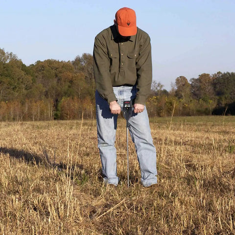 Person using Soil Compaction Tester With 24 Inch Meter, Tough Molded Housing And Rubber Grip Handles in a field
