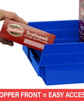 Heavy Duty Shelf Bins For Garage And Closet Organization, Built To Last Plastic Storage Bins Great For Drawers And Cabinets, 24 Inch By 11 Inch By 4 Inch, Blue, Set Of 6 For Versatile Under Sink And Shelf Storage showing hand placing box into blue bin.