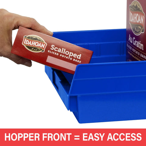 Hand placing box in blue storage bin with hopper front for easy access, part of Plastic Nesting Shelf Bins Set 24 Inch By 11 Inch By 4 Inch Yellow 6 Pack Tough Storage Boxes For Shelves Cabinets Garage And Under Sink Organization Today.