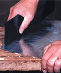 12-Inch Sheet Metal Folding Tool For HVAC Pros in use, bending metal on a wooden table, showcasing dual throat depth settings.