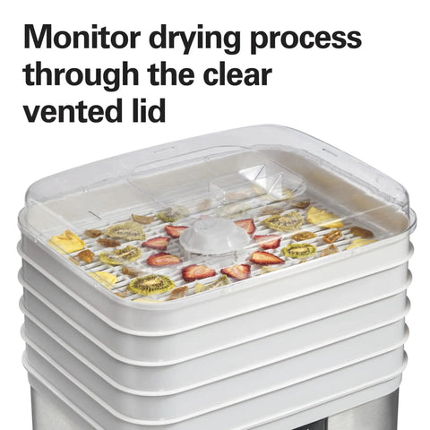 Digital Food Dehydrator With Five Stackable Bpa Free Trays And Adjustable Thermostat For Crafting Tender Jerky Crispy Veggie Chips Natural Fruit Leather And Homemade Treats A Straight Up Game Changer showing vented lid and drying fruit.