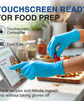 Person using Blue Nitrile Exam Gloves Workhorse For Medical, Food Prep, Cooking And Cleaning Tasks, Disposable Latex Free Powder Free, Medium Size while preparing food and using tablet.