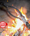 40 Inch Heavy Duty Fire Tongs With Scissor Style Serrated Claws, Long Reach Log Grabber For Fire Pit And Fireplace, Ergonomic Rubber Grip Handle, Indoor Outdoor Use, Safe, No Bending Heavy Logs gripping a burning log over a fire