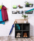 Six Piece Pegboard Basket Set Wall Mount Bins For Tools And Crafts In Black Three Sizes For Garage Workshop Slatwall Organization Durable Heavy Duty Construction Fits Standard Pegboard Hooks For Easy Access Tool Storage installed on a white pegboard with assorted tools and crafts.