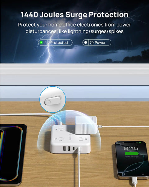 Two Prong Power Strip With 10Ft Cord And 1440J Surge Protector Turns One Old Two Hole Outlet Into Four 3 Prong Outlets And Four USB Ports Wall Mount White showing surge protection feature on a wooden desk with devices