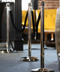 U2140 Premier Chrome Post And Black Velvet Rope Crowd Control Stanchions For Event Barriers with slim stainless steel base.