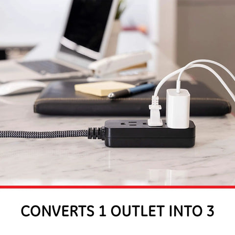 Pro Mini 3 Outlet Power Strip With 6 Inch Designer Braided Cord on desk, powering devices, black and gray chevron cable, flat plug