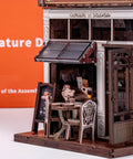 DIY Miniature Coffee Shop Kit With LED Light For Adults Teens And Kids, detailed 3D wooden puzzles of cafe exterior on display