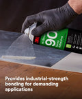High Strength Spray Adhesive Glue Clear Fast Dry Formula 19 Oz Aerosol Can applied to metal surface for strong bonding.