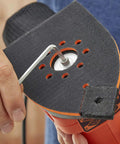Person adjusting the sanding head of the Pick Up This Bad Boy Heavy Duty Multi Sander With 200 Watt Motor, 4 In 1 Orbital And Finger Sanding Heads.