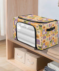 Heavy Duty Foldable Storage Bin With Large Clear Window And Dual Zipper Openings For Quick Grab Access Interior Steel Frame Keeps Structure Intact Festive Pumpkin Ghost Art Collage on shelf with visible interior.